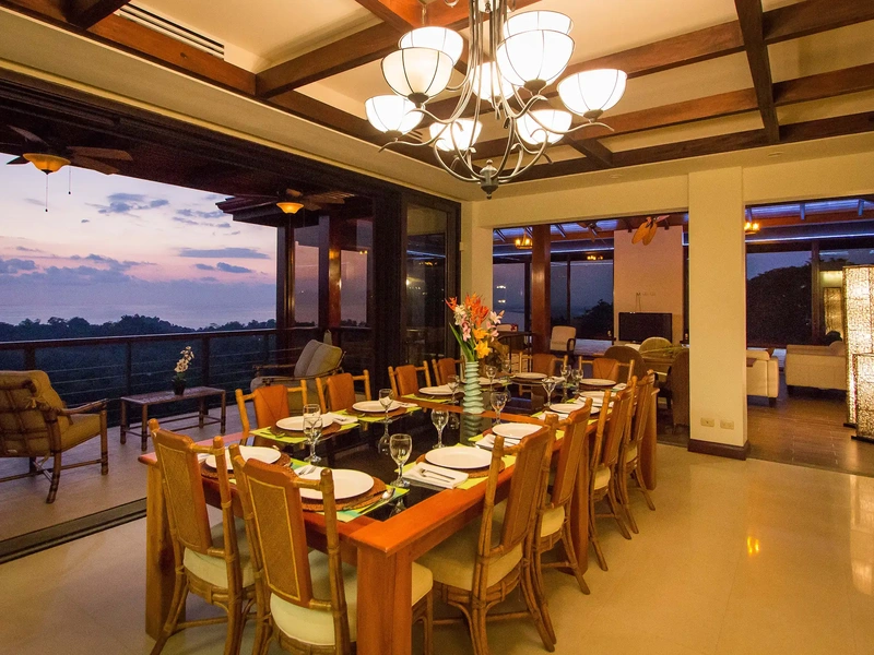 Sunset dinner table at an eight-bedroom ocean view estate in Manuel Antonio